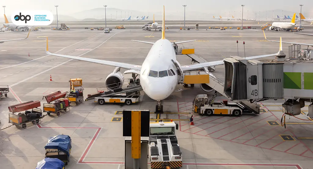airplane parked and being prepared at an airport terminal